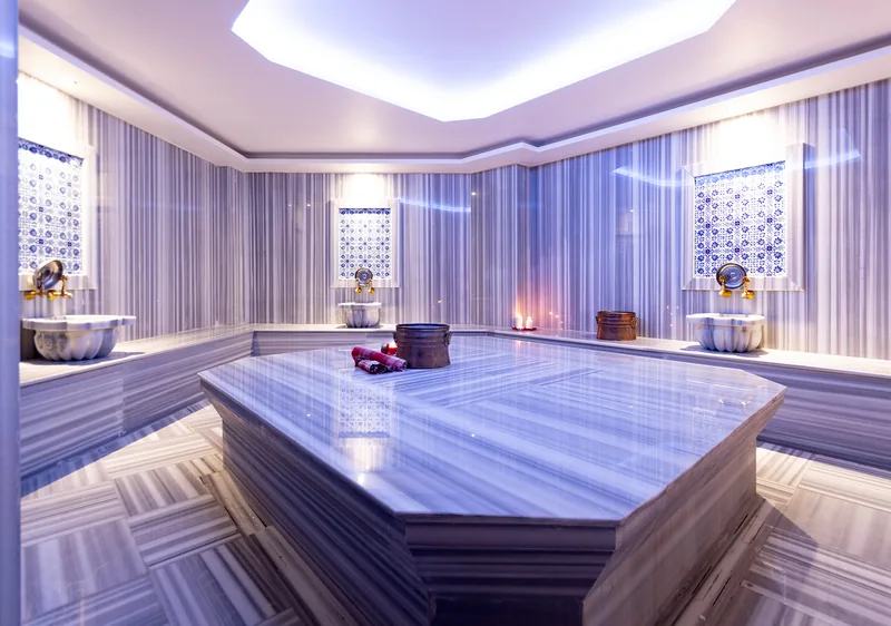 Marble heated stone under a lit ceiling