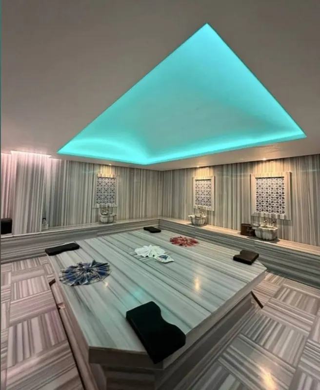 Marble hamam room with basins