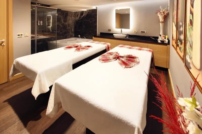 Massage room with two tables